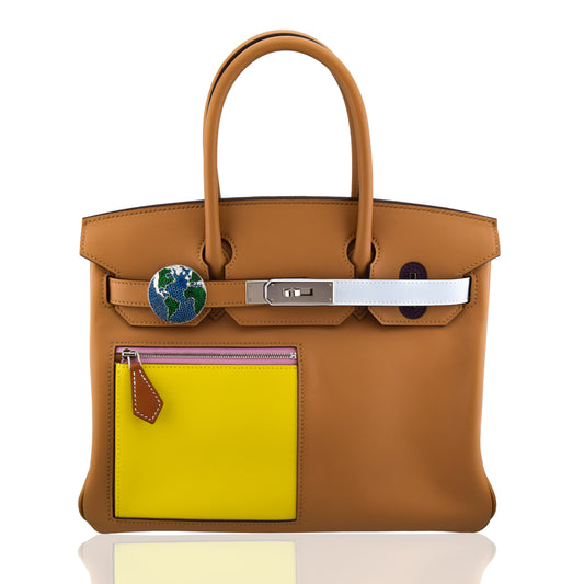 Brown handbag with a yellow patch and visible brand logo on a white , collection-previewbackground