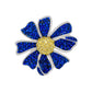 Blue flower-shaped object with a yellow center on a white background