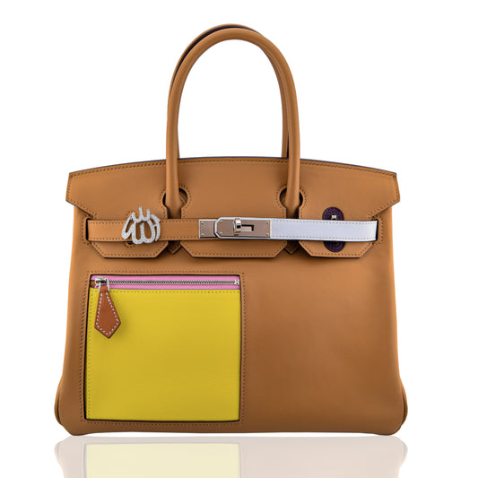 Brown handbag with a yellow patch on a white background, collection-preview