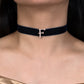 Black velvet choker with a decorative 'F' charm worn by a model.