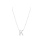 Silver necklace with a 'K' pendant on a white background