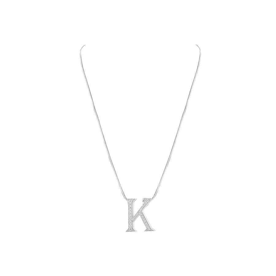 Silver necklace with a 'K' pendant on a white background