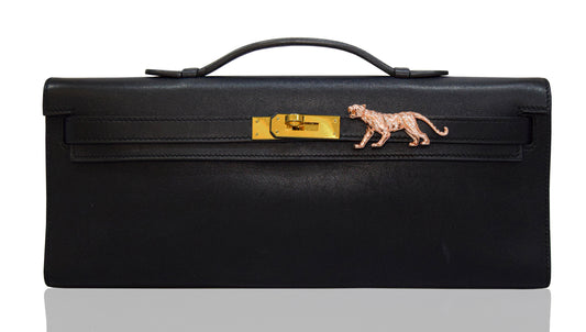 Black leather briefcase with gold lion emblem on a white background, collection-preview